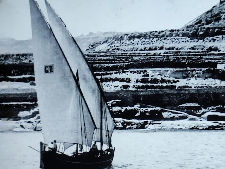 Traditional sailing boat in Xlendi
