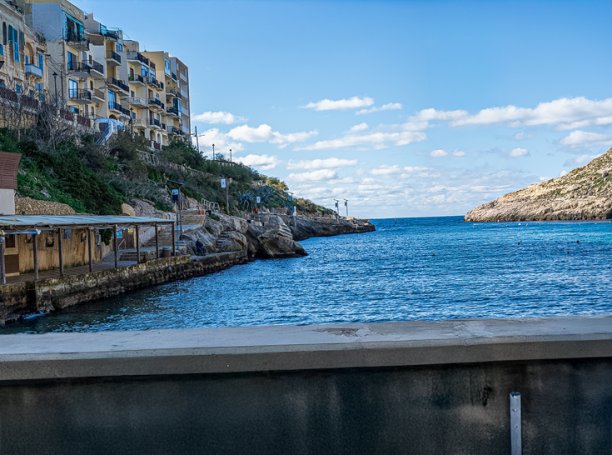 Tranquil view of Xlendi bay