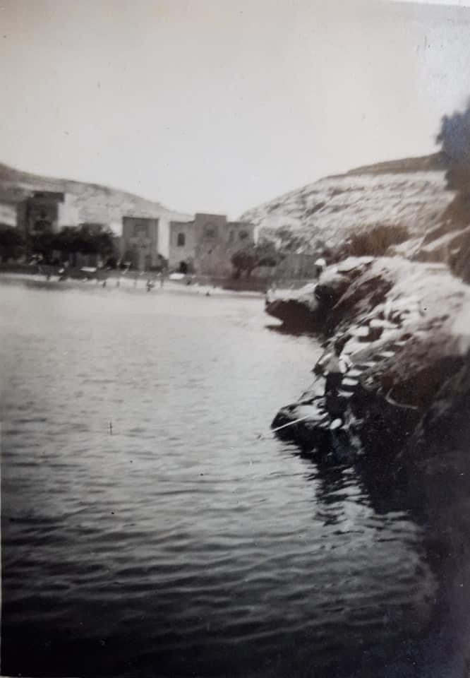 Xlendi bay's tranquil waters