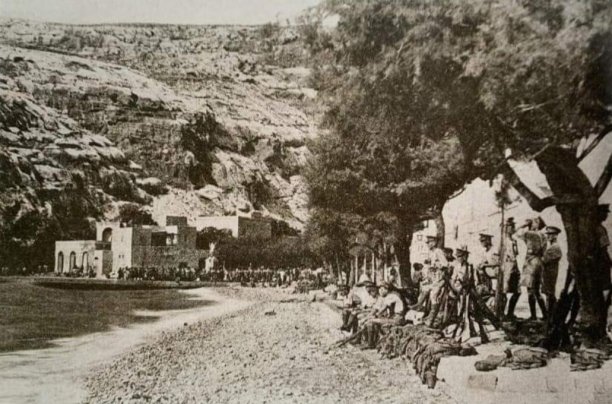 Military presence on Xlendi bay shore