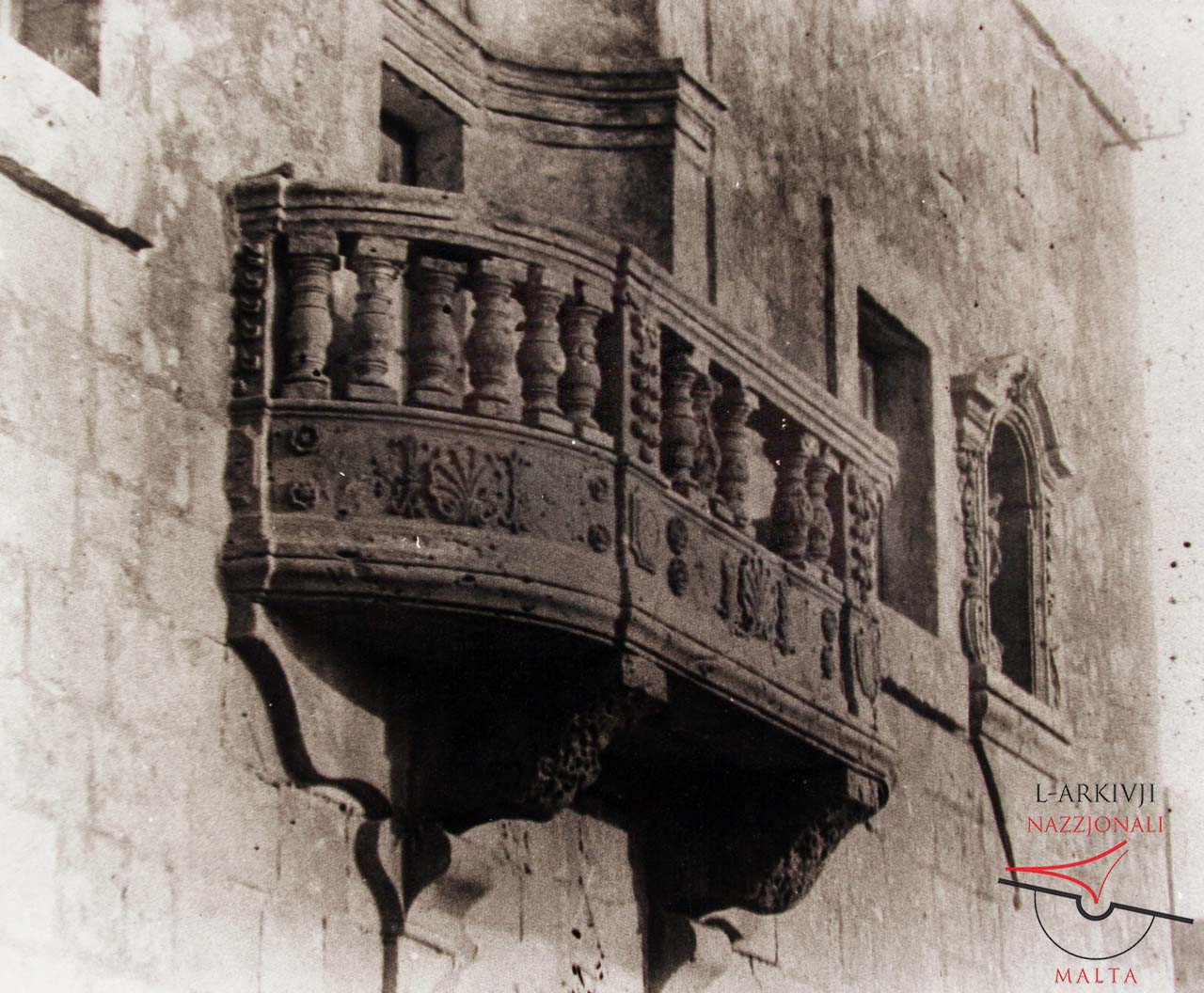 Stone balcony on Strada Corsa