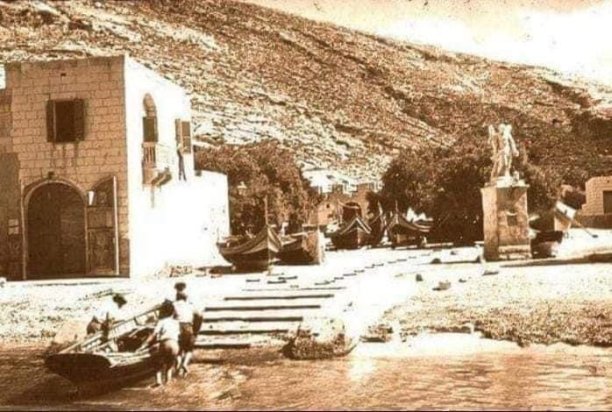 Xlendi’s coastal charm with St Andrew's statue