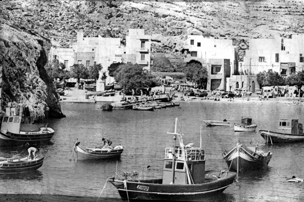 Bustling harbour at Xlendi bay