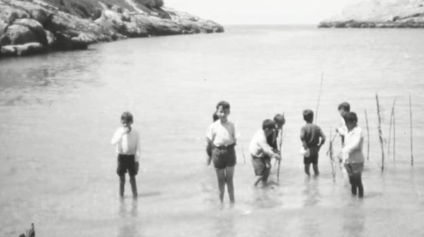 Children playing in Xlendi bay