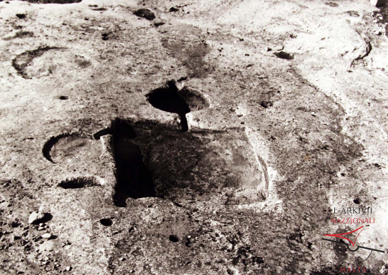Ancient troughs and channels at Wied tal-Kissi