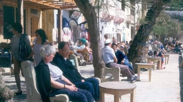 Relaxing by Xlendi's promenade