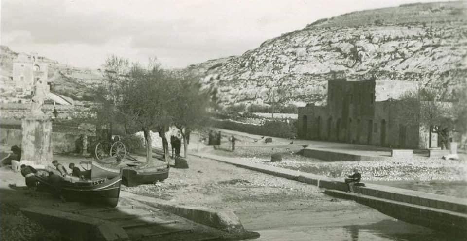 Tranquil Xlendi bay scene
