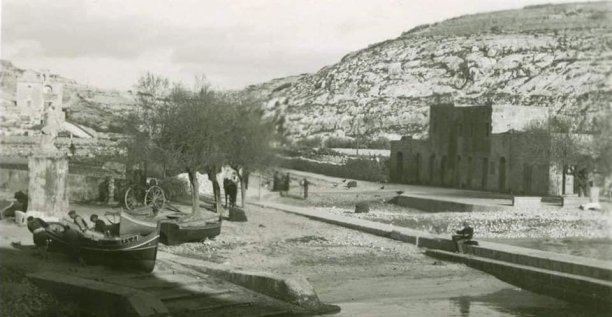 Tranquil Xlendi bay scene