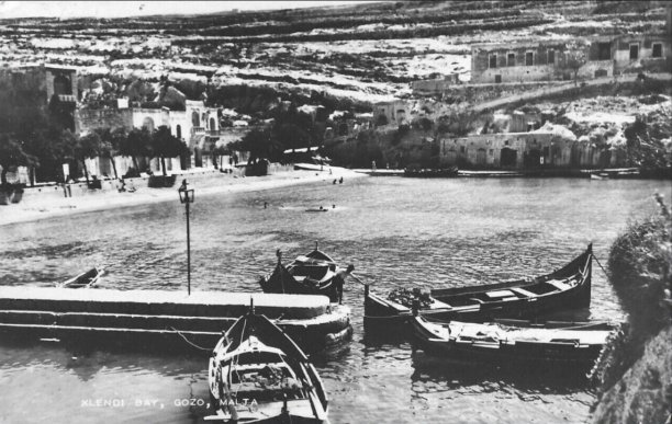 Boats resting at Xlendi bay