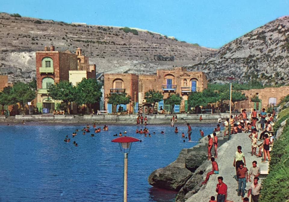 Busy summer day at Xlendi bay