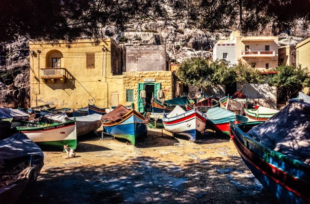 Traditional fishing boats at Xlendi bay