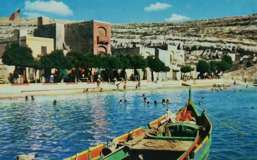 Xlendi bay’s vibrant waters