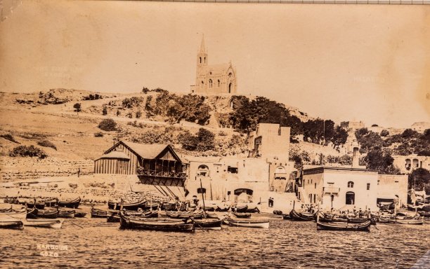 View of Mgarr Harbour with Lourdes chapel in the background