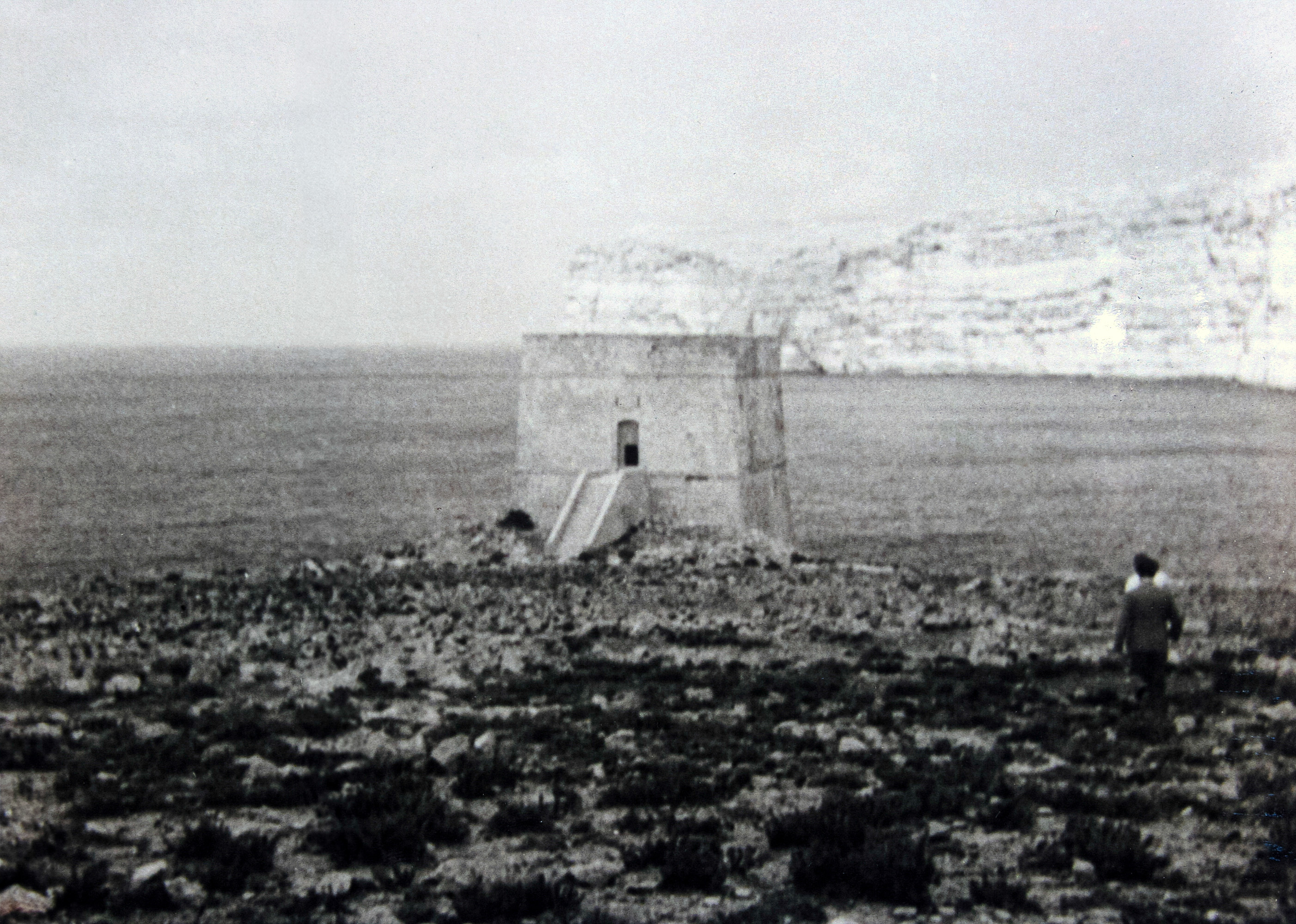 Xlendi Tower facing the cliffs