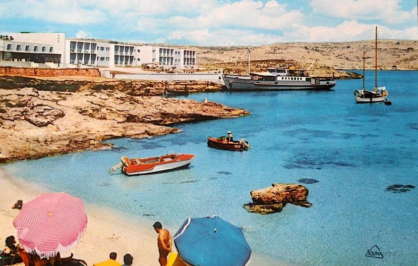 Swimmers at Comino bay