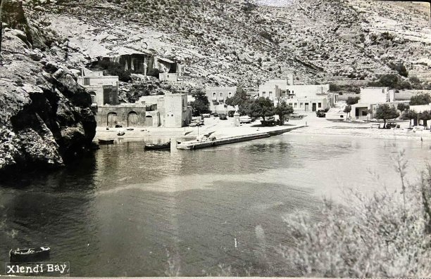 Xlendi bay waterfront scene