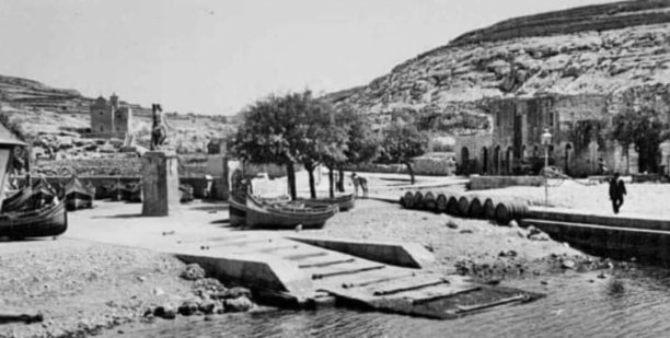 Xlendi bay's serene waterfront