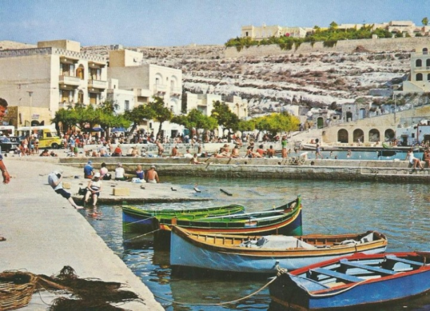 Bustling summer bay at Xlendi bay