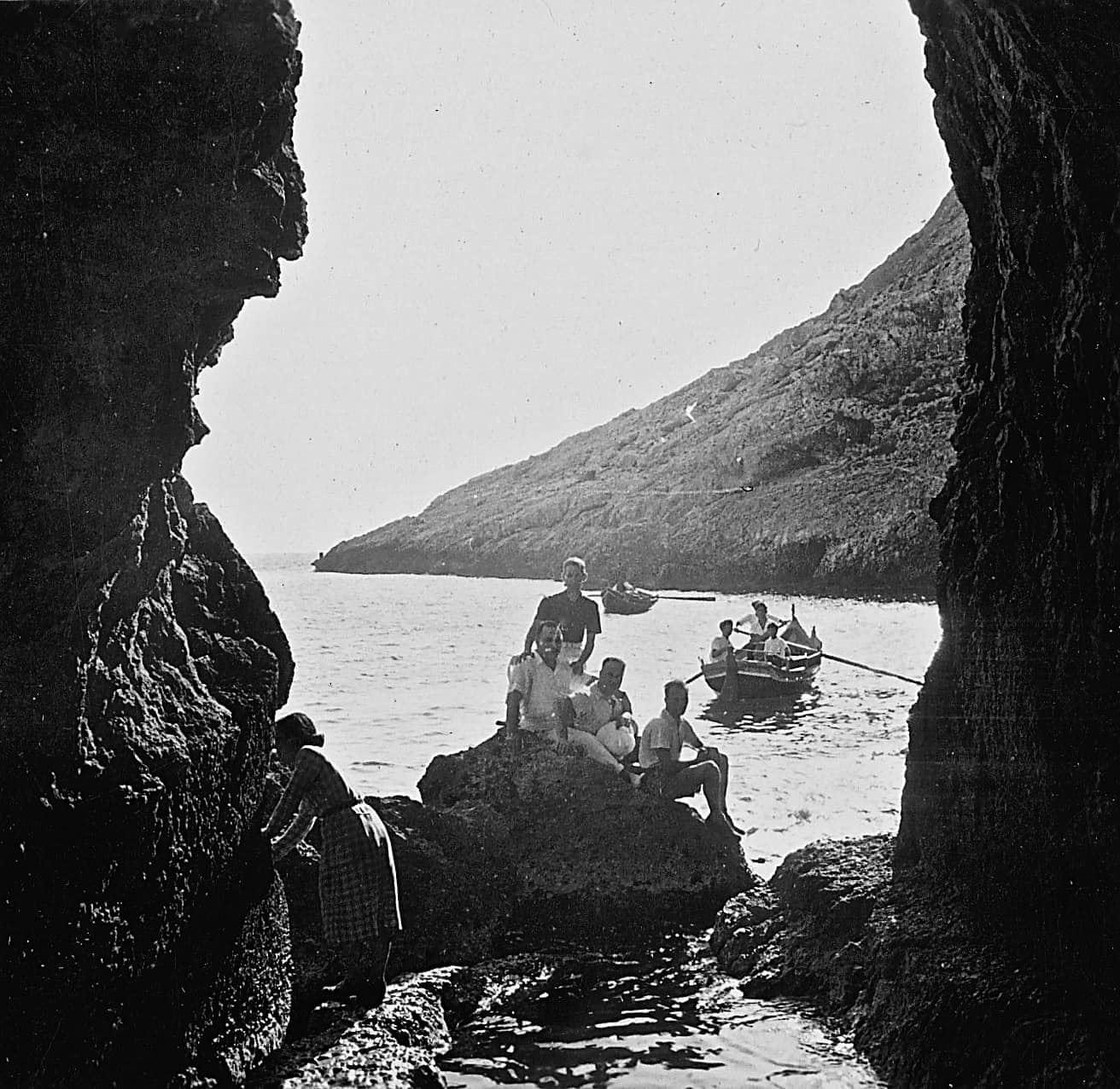 Exploring Xlendi's rocky caves