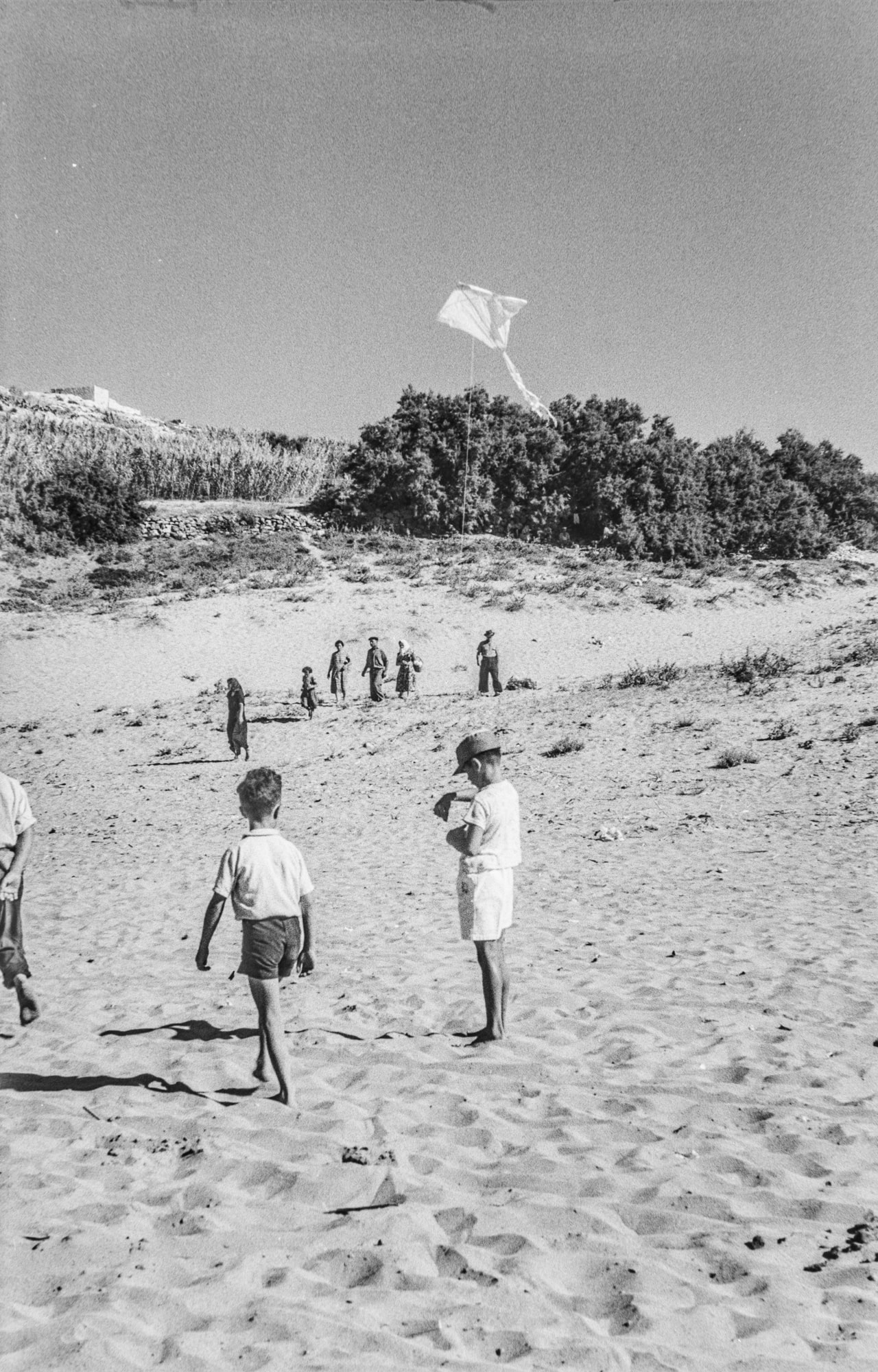 Children flying a kite at Ramla