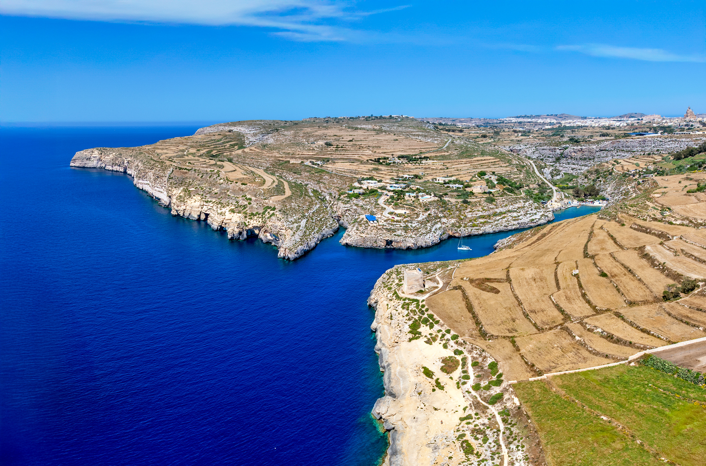 Aerial photo of Mġarr ix-Xini Bay and Ta’ Ċenċ