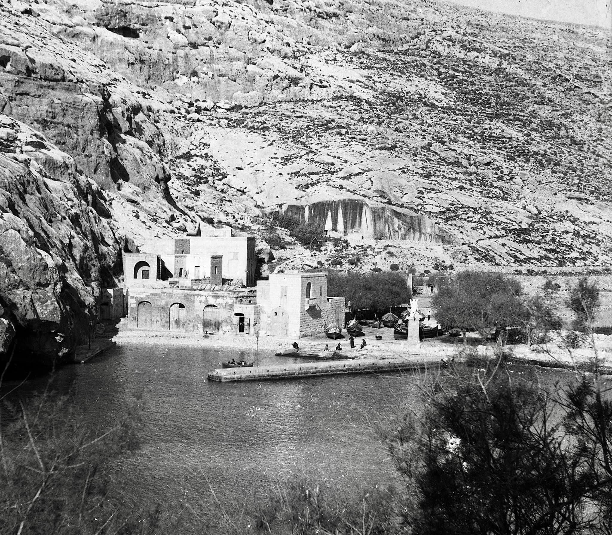 Xlendi bay traditional boathouses