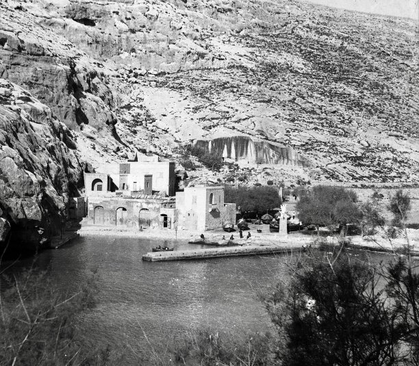 Xlendi bay traditional boathouses