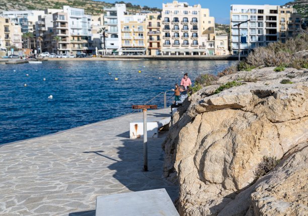 View of Xlendi bay promenade