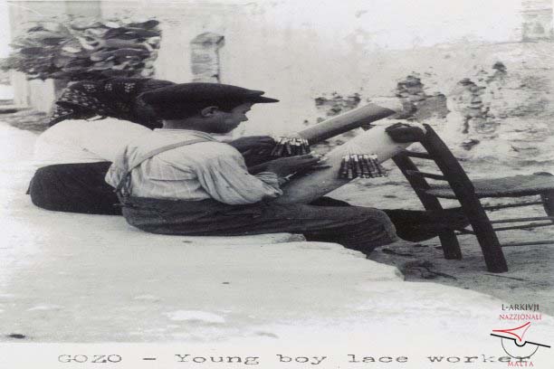 A young lace-worker boy