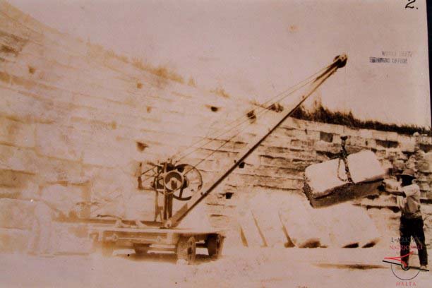 Mobile crane in action at the breakwater extension