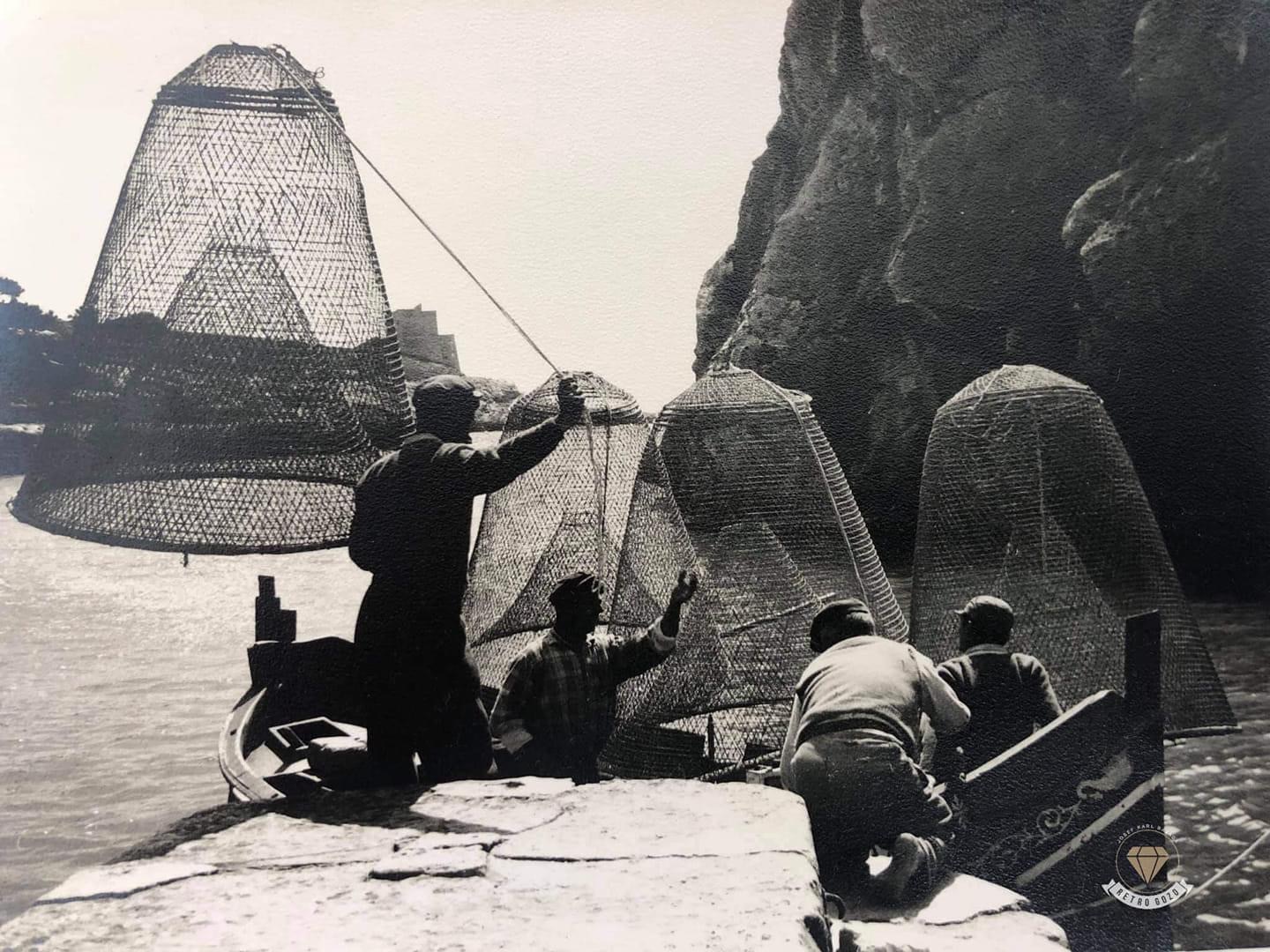 Fishermen preparing nets in Xlendi bay